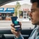 An Image Of A Guy Using Voice Search