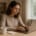 A Person Is Focused On Typing A Specific Search Query On Their Laptop Keyboard, Likely Searching For Long Tail Keywords To Enhance Their Seo Strategy. The Scene Captures The Essence Of Keyword Research, Highlighting The Importance Of Finding Relevant Keywords For Better Search Engine Results.